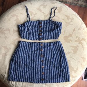 Two-piece skirt and crop top outfit